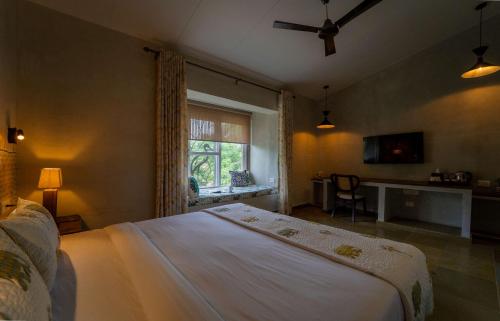 Ein Bett oder Betten in einem Zimmer der Unterkunft Tehla Bagh