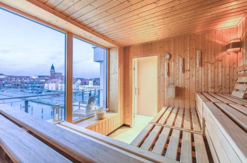 Imagen de la galería de Müritz Utkiek - Apartment mit Seeblick & Balkon in der Hafenresidenz, en Waren