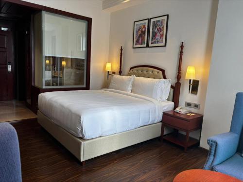 Ein Bett oder Betten in einem Zimmer der Unterkunft Hotel Greenberry Narkanda
