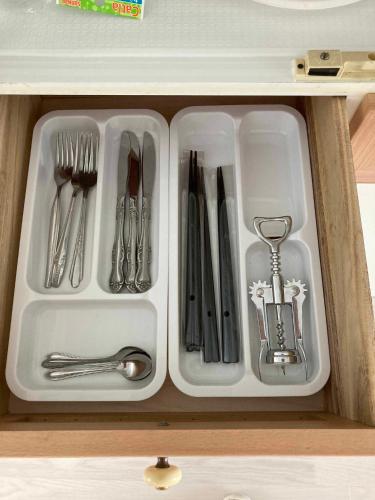 a drawer filled with silver utensils in a drawer at sunset hills - Vacation STAY 21373v in Hamada