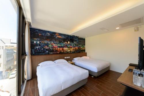 Una cama o camas en una habitación de 杰克山莊渡假大飯店