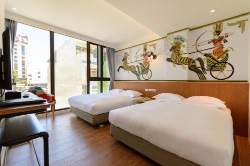 Voodi või voodid majutusasutuse 杰克山莊渡假大飯店 toas