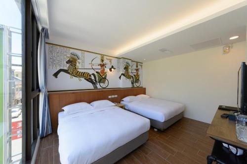 Una cama o camas en una habitación de 杰克山莊渡假大飯店