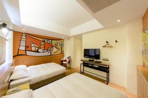 Una cama o camas en una habitación de 杰克山莊渡假大飯店