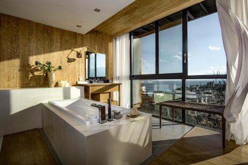 Posezení v ubytování Dali Shuanglang Gesang Seaview Hotel
