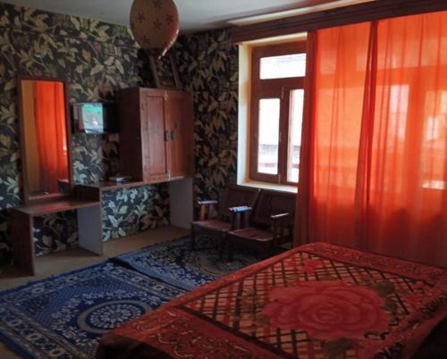 Ένα ή περισσότερα κρεβάτια σε δωμάτιο στο Potala Hotel