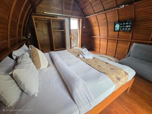 Letto o letti in una camera di Umah lumbung bedugul