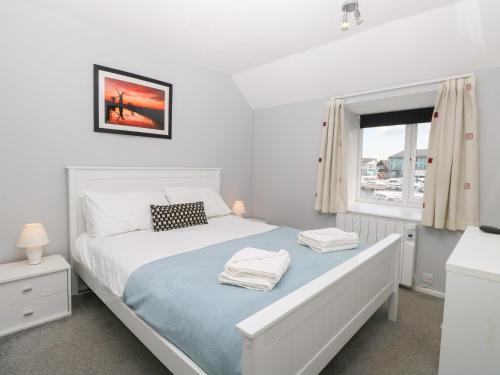 Voodi või voodid majutusasutuse Cotman Cottage toas