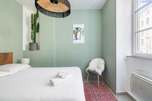 Katil atau katil-katil dalam bilik di T2 Cocooning au coeur de Vienne