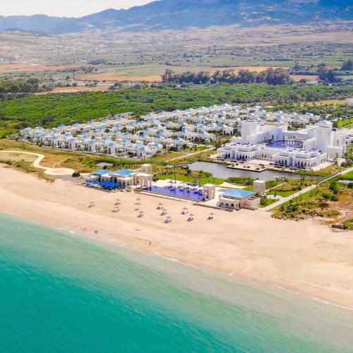 an aerial view of a resort on the beach at Banyan Tree Tamouda Bay in Fnidek
