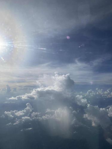 a view of the sky with clouds in the sky at Villa That Luang Legend in Luang Prabang