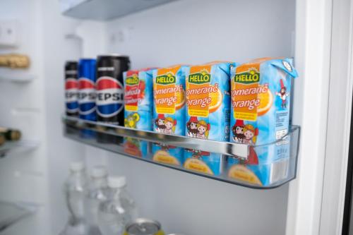 a shelf in a refrigerator filled with lots of toothpaste at Apartmán Radvanička in Radvanice