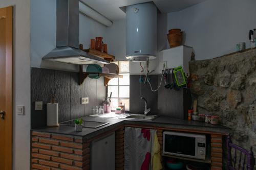 Η κουζίνα ή μικρή κουζίνα στο estudio mirador