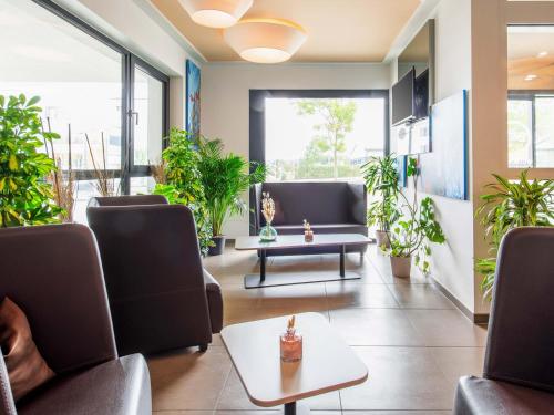Χώρος καθιστικού στο B&B Hotel Landshut