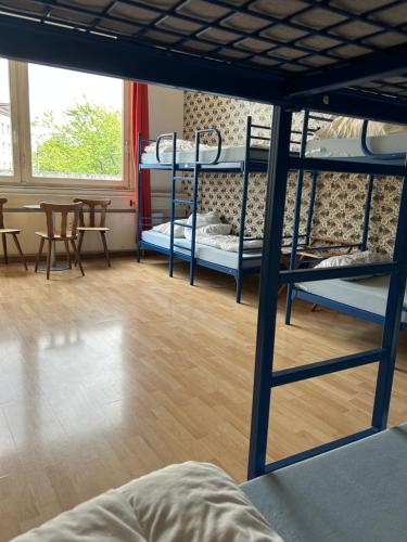 Postel nebo postele na pokoji v ubytování Comebackpackers