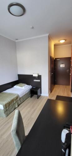 Letto o letti in una camera di Hotel Topaz Poznań Centrum