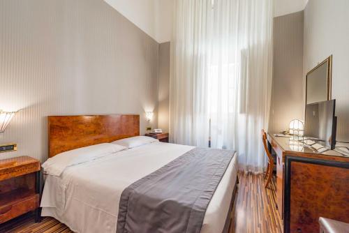 Postel nebo postele na pokoji v ubytování Best Western Hotel Artdeco