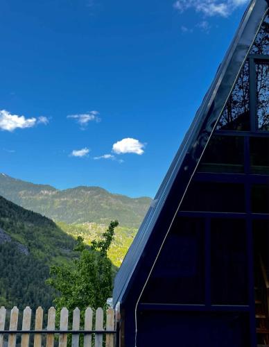 a roof of a house with mountains in the background at Chalet Adjara 