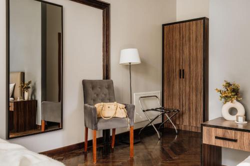 Katil atau katil-katil dalam bilik di Grottger Luxury Boutique Hotel City