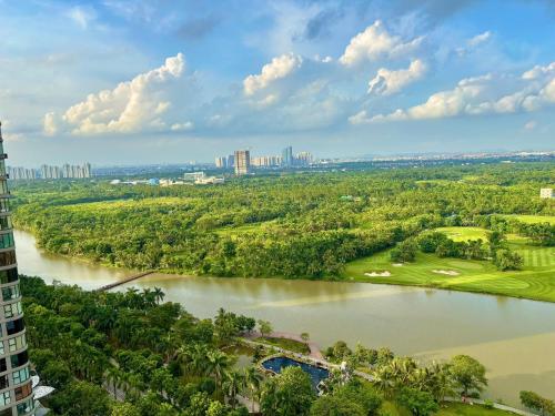 an aerial view of a river and a city at Homestay Ecopark Hung Yen by QMP in HÆ°ng YÃªn
