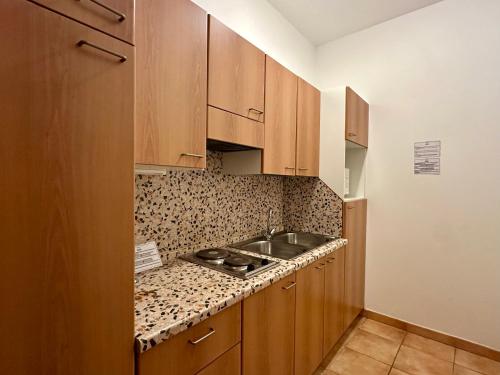 Kuchyň nebo kuchyňský kout v ubytování Aparthotel Englovacanze