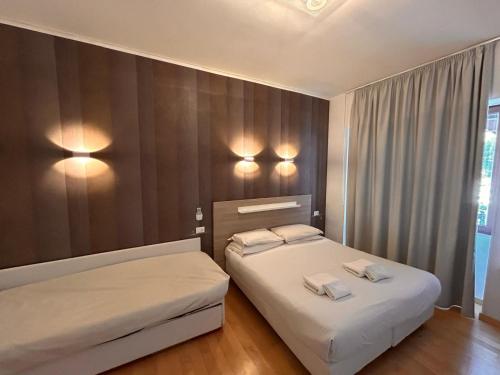 Ένα ή περισσότερα κρεβάτια σε δωμάτιο στο Luciano Laterani Guest House