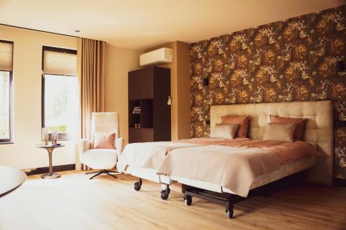 En eller flere senge i et værelse på Bij Corine, bed en zorg