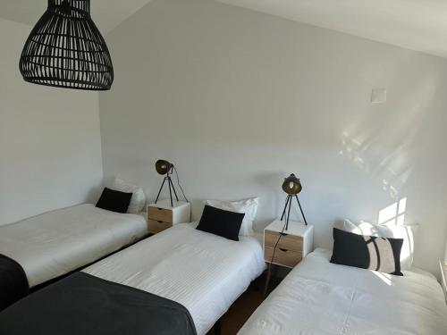 Ένα ή περισσότερα κρεβάτια σε δωμάτιο στο Quinta da Mina 31