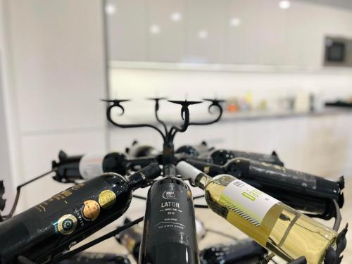 a close up of a bike with a bottle on it at Maul - Lator vendégház in Villány