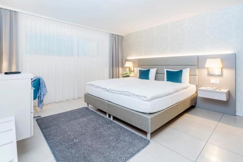 Letto o letti in una camera di CITY STAY - Lindenstrasse