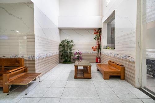 Posezení v ubytování Collection O District 12 - Mau Tim Hotel
