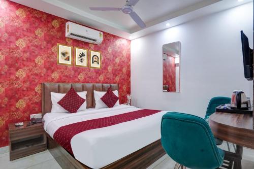 Ένα ή περισσότερα κρεβάτια σε δωμάτιο στο Hotel King Plaza Near Delhi Airport