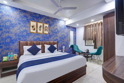 Ένα ή περισσότερα κρεβάτια σε δωμάτιο στο Hotel King Plaza Near Delhi Airport