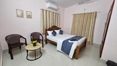 Postel nebo postele na pokoji v ubytování Tides & Tales