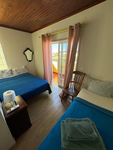 Ένα ή περισσότερα κρεβάτια σε δωμάτιο στο Oceans House Villa