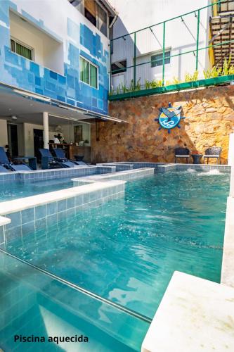 a swimming pool at a hotel at Pousada Bahia Inn in Morro de São Paulo