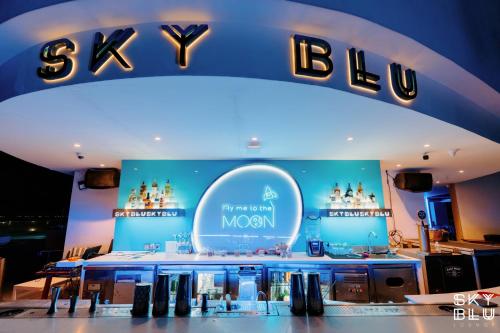 a store with a sign for a mons store at VELA OCEAN LUXURY SUITES Nha Trang Centre in Nha Trang