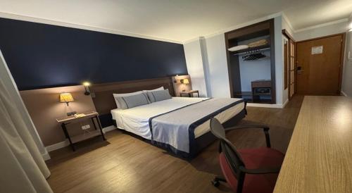 Ένα ή περισσότερα κρεβάτια σε δωμάτιο στο Comfort Hotel Araraquara