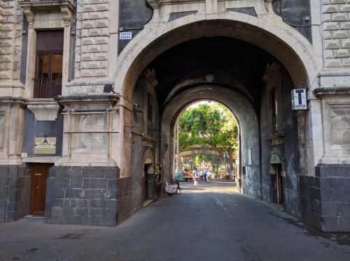 an archway in the side of a building at Duomo Bed & Breakfast in Catania