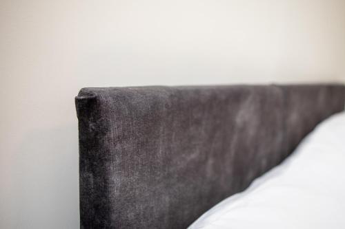a close up of the corner of a bed at St James Court Hotel in Derby