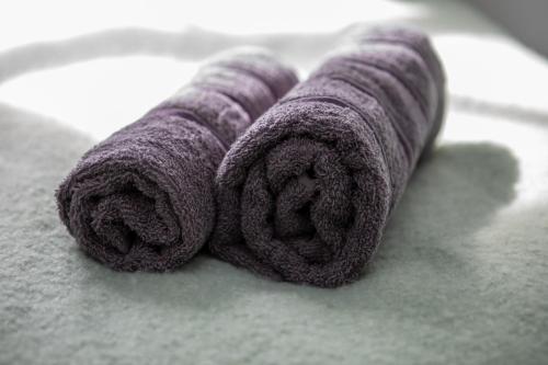 a rolled up towel on top of a table at St James Court Hotel in Derby