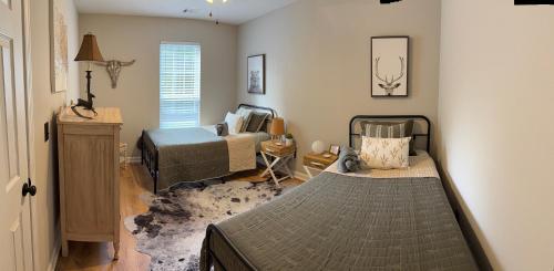 a bedroom with a bed and a window at The Nest - A Getaway with a Huge Game Room in Ranger