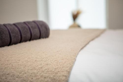 a close up of a brown rug on a floor at St James Court Hotel in Derby
