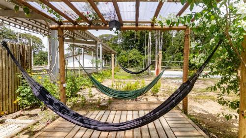 Un jardín fuera de ITAKAA RESERVA Piscina, Hidro e Churrasqueira