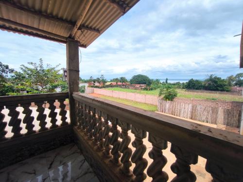 a view from the balcony of a house at Tokpa Dome Appart Garden 