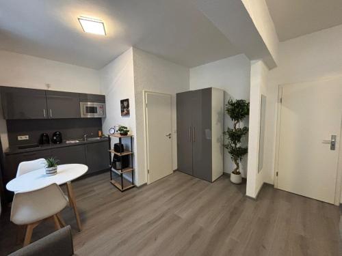 Кухня или мини-кухня в City Apartment Bochum

