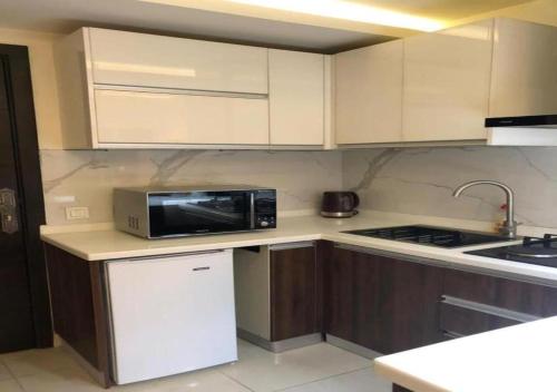 Kuchyň nebo kuchyňský kout v ubytování Elysium Tower Premium Serviced Luxury Apartment Islamabad