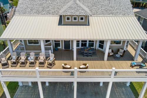 an aerial view of a house with a deck at Casa Del Sol home in Stingaree