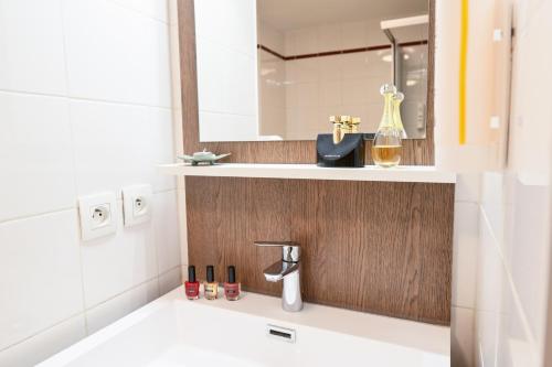 Bagno di Comfort Aparthotel Versailles, St Cyr l'Ecole