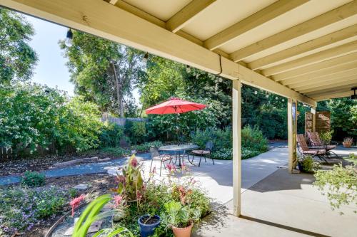 a patio with a table and an umbrella at about 3 Mi to Dtwn and Chico State NorCal Escape! in Chico